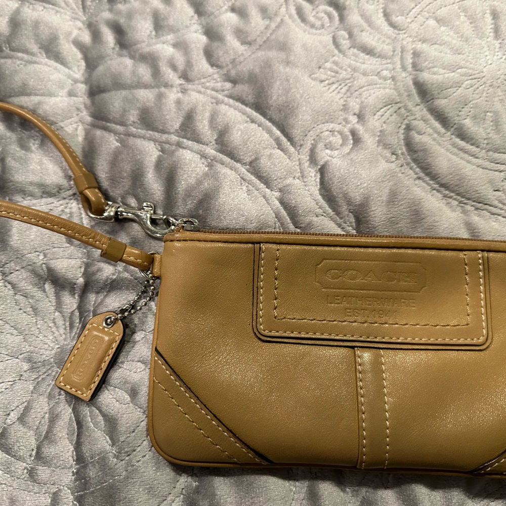 Coach Wristlet Nude color.